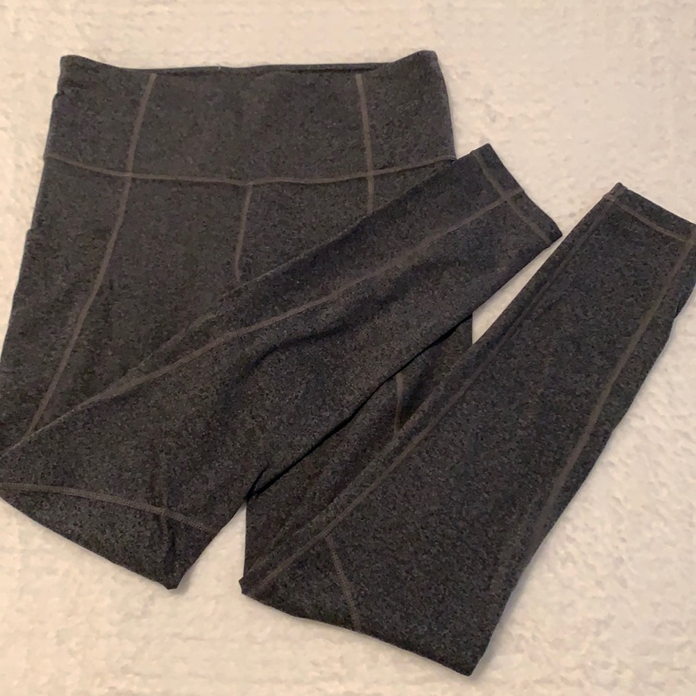 Athleta stash pocket salutation tight